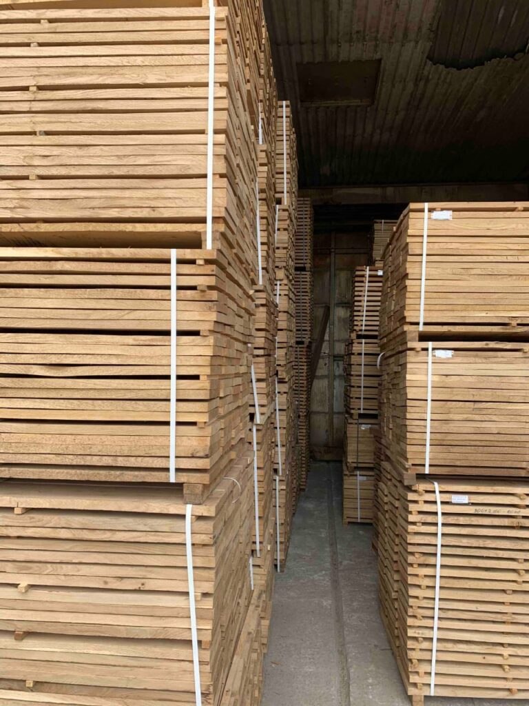 Sawn oak boards stacked in the kiln drying facility