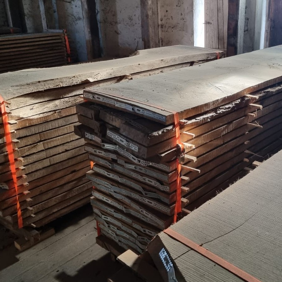 Stacks of oak boards from the Lumber Eco Tec timber collection