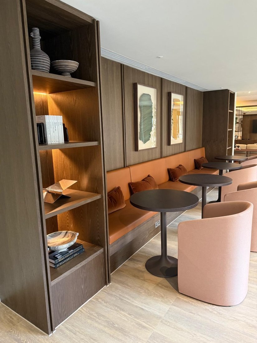 Bespoke seating and fitted cabinetry in a hospitality interior